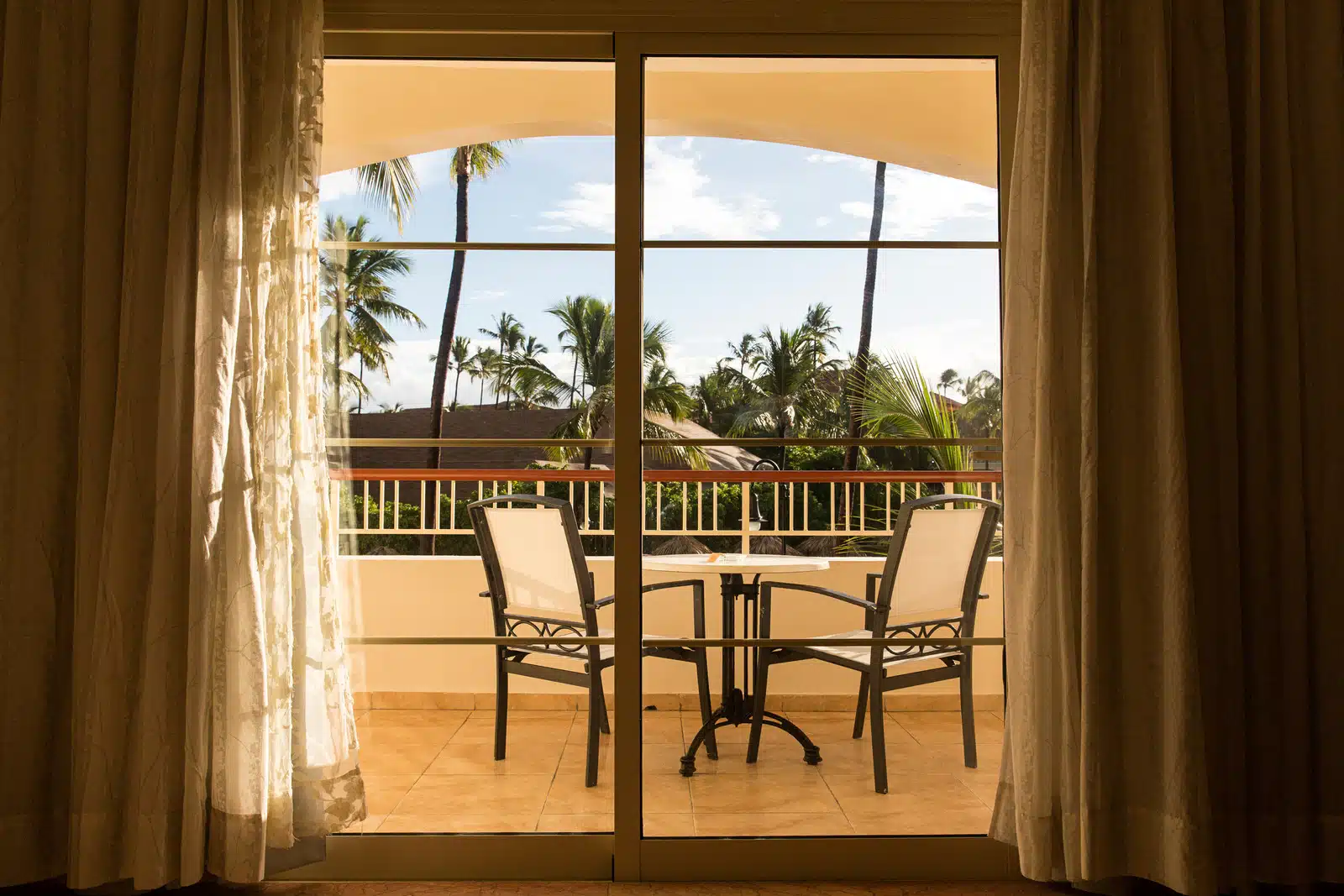 balcony through the sliding glass door in the morningbalcony through the sliding glass door in the morning